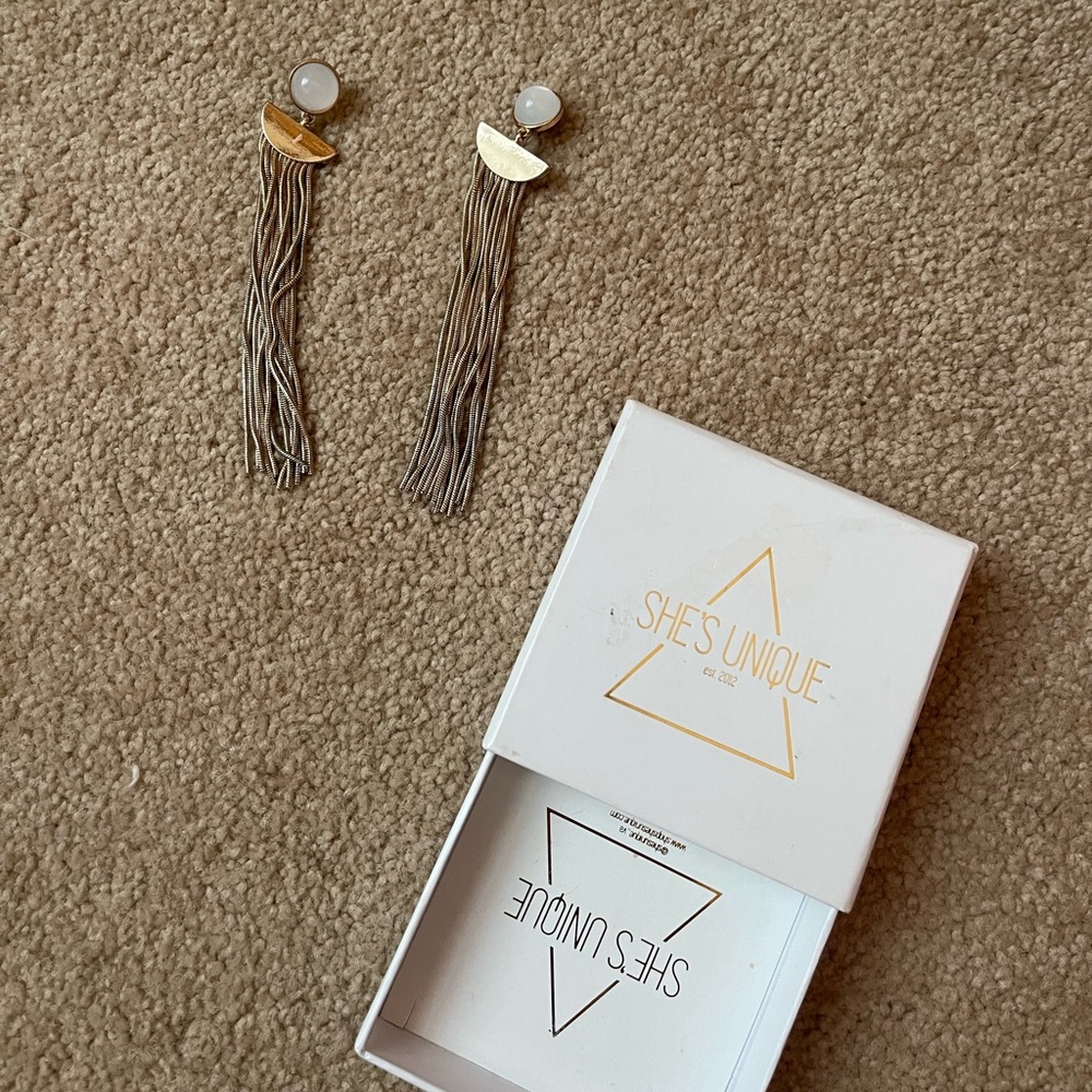 She’s unique earrings